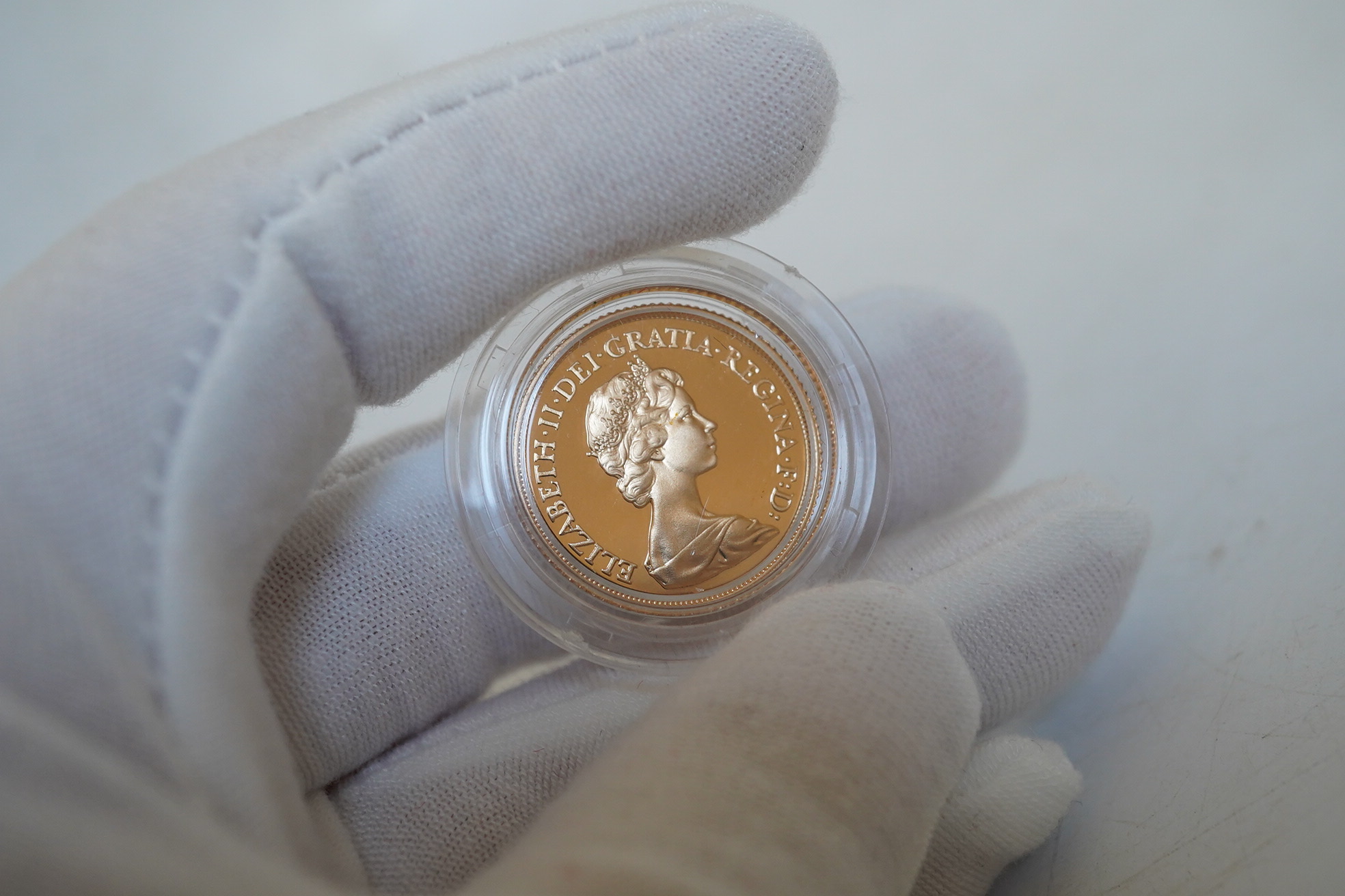 Elizabeth II gold and silver proof coins, Royal Mint UK two coin commemorative set, comprising 1981 proof gold sovereign and Royal Marriage proof silver crown, in case of issue with certificate